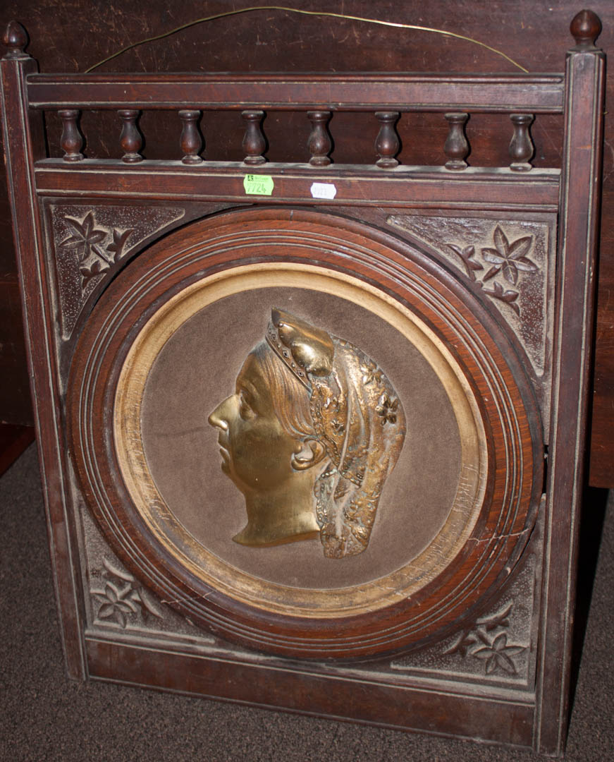 Appraisal: Decorated walnut furniture section center metal medallion of Queen Victoria