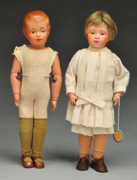 Appraisal: Lot of Schoenhut Boy Dolls Description All wood with spring