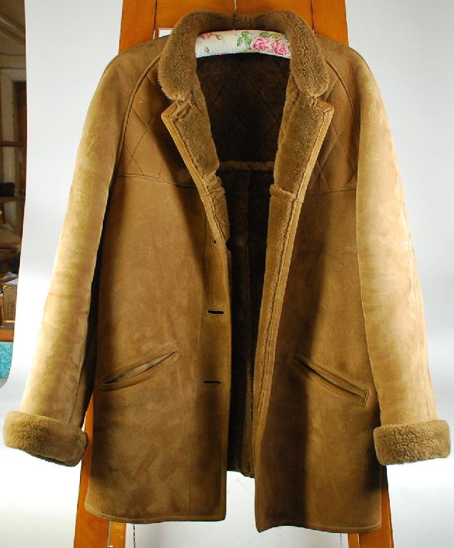 Appraisal: SHEEPSKIN WAREHOUSE' LADY'S HAND CRAFTED NATURAL LAMB SKIN LONG JACKET