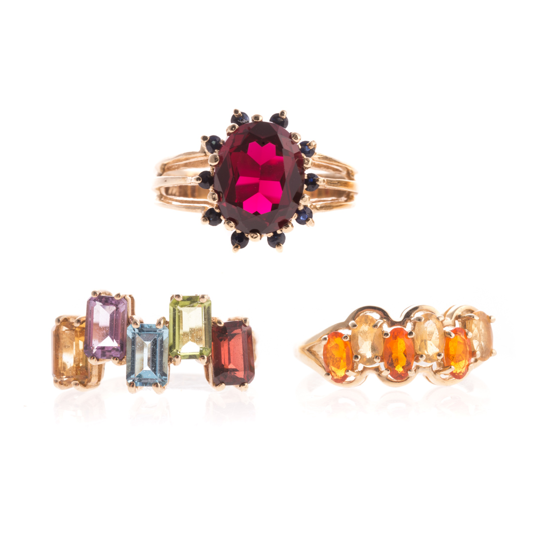 Appraisal: A Trio of Lady's Gemstone Rings in Gold K yellow