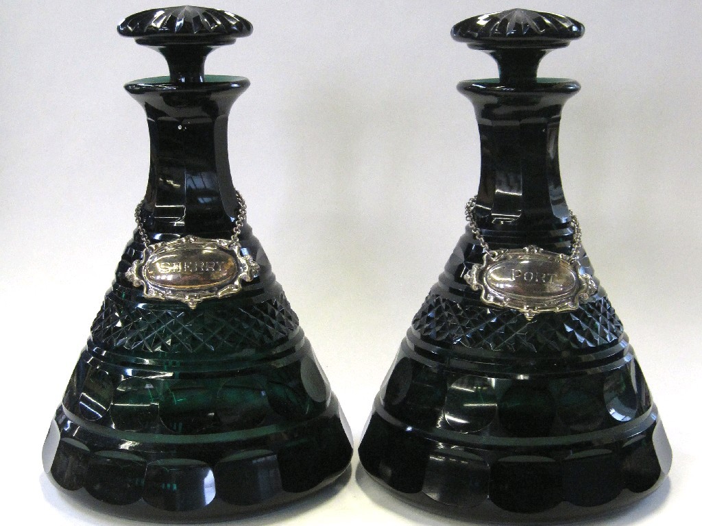 Appraisal: Pair of Georgian style green glass ships decanters with facet