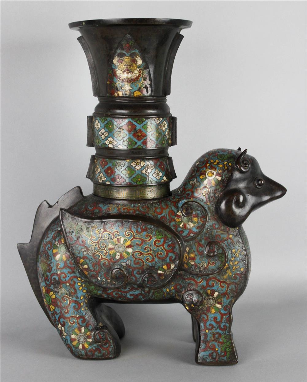 Appraisal: CHINESE CLOISONNE ENAMEL ARCHAISTIC BEAST formed as a stylized mythical