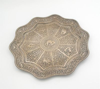 Appraisal: A late th century Indian salver with a wavy bead