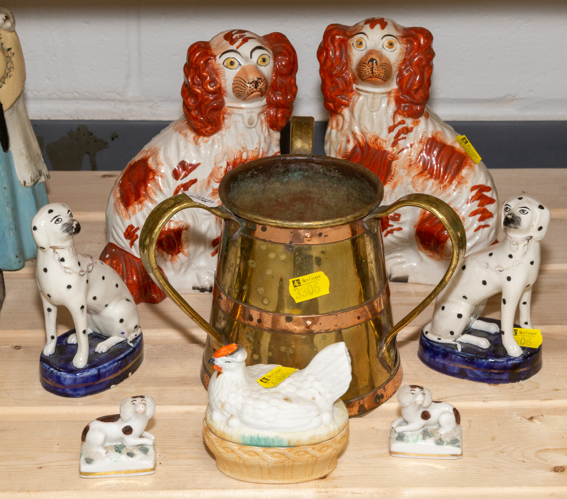 Appraisal: EIGHT DECORATIVE ITEMS Includes three pairs of Staffordshire style dog