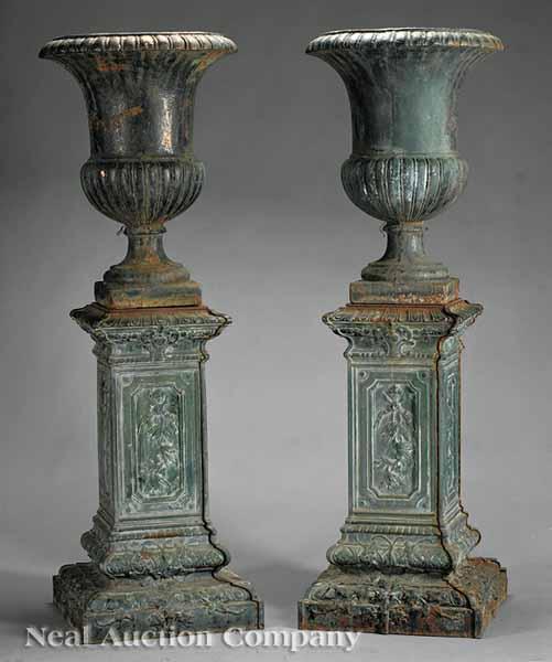 Appraisal: A Good Pair of Antique Cast Iron Urns on Pedestals