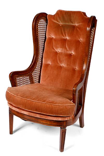 Appraisal: A pair of English style caned wing chair height in