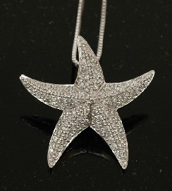 Appraisal: A diamond starfish pendant enhancer Set with one hundred and