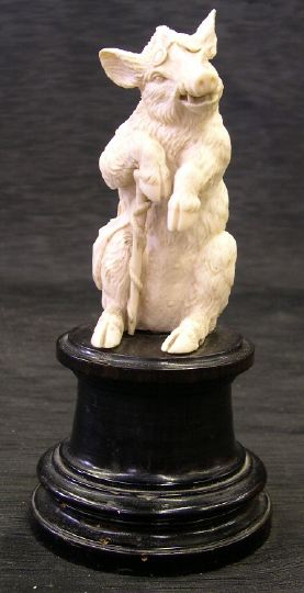 Appraisal: Fine and Amusing German Carved Ivory Figure of a Seated