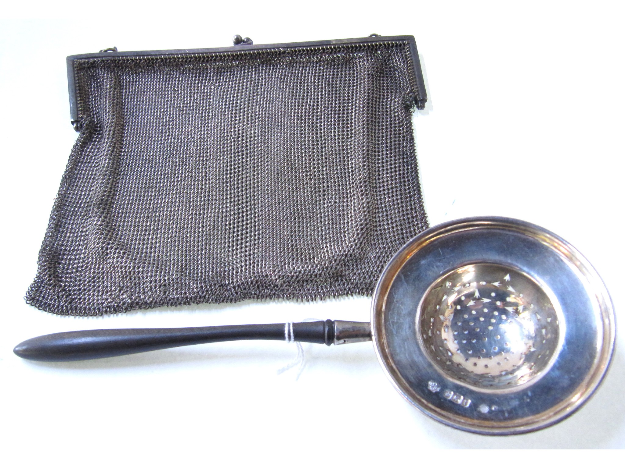 Appraisal: A lot comprising a metal mesh purse and a silver