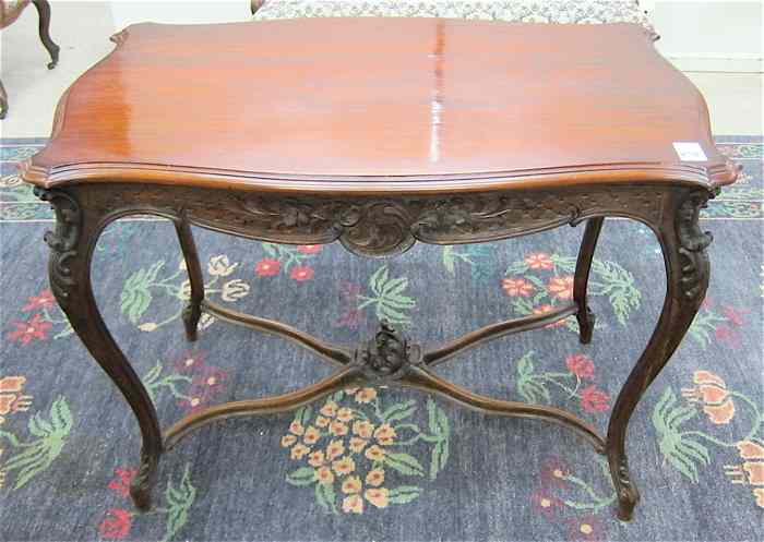 Appraisal: LOUIS XV STYLE CARVED MAHOGANY CENTER TABLE French c having