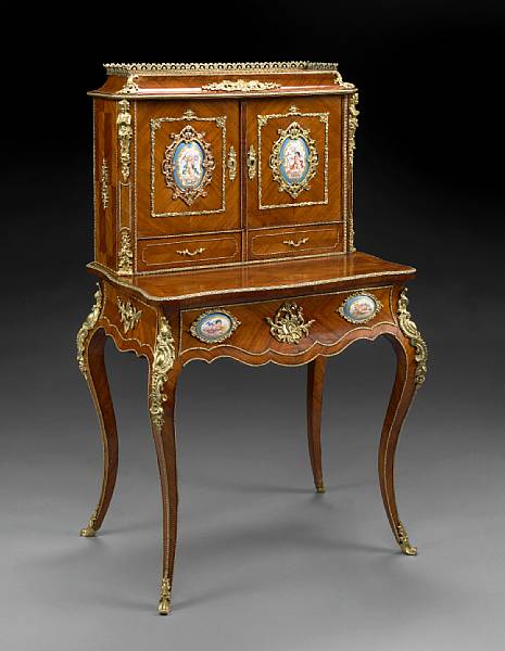 Appraisal: A Louis XV style gilt bronze and porcelain mounted walnut