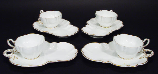 Appraisal: Four George Jones Edwardian bone china cups and tea plates