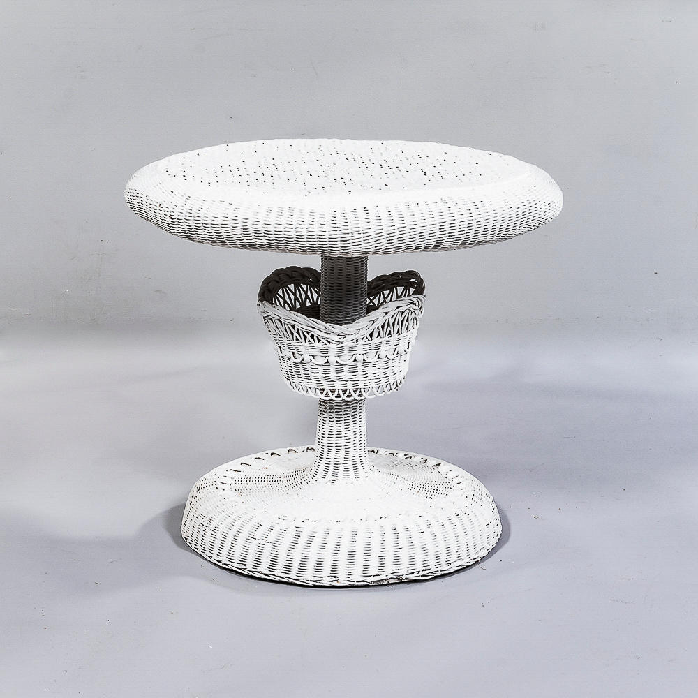 Appraisal: WHITE WICKER CENTER TABLE the shaft with a basket-form ornament