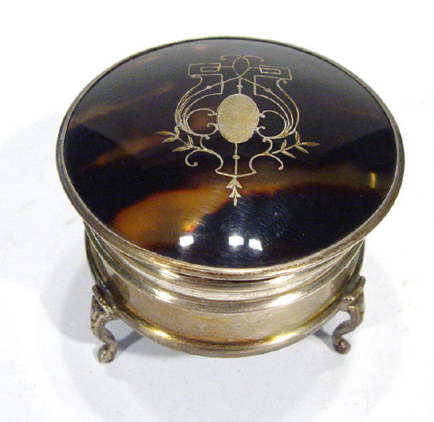 Appraisal: Victorian circular silver box with silver inlaid tortoiseshell top on