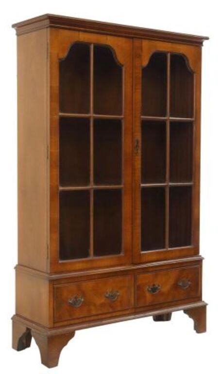 Appraisal: English Georgian style walnut bookcase th c having dual paned