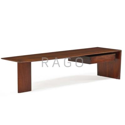 Appraisal: VLADIMIR KAGAN b KAGAN-DREYFUSS Walnut coffee table with drawer New