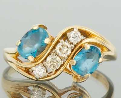 Appraisal: A Ladies' Topaz and Diamond Ring k yellow gold ring