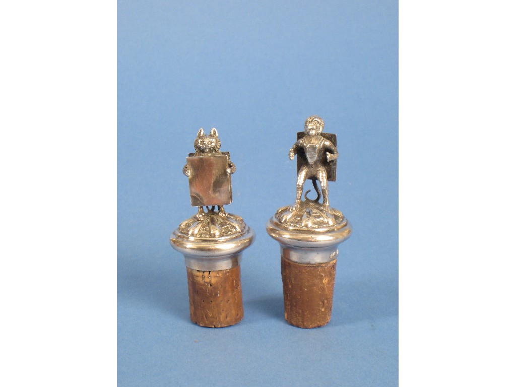 Appraisal: Pair of Victorian Bottle Stoppers the finials cast as standing