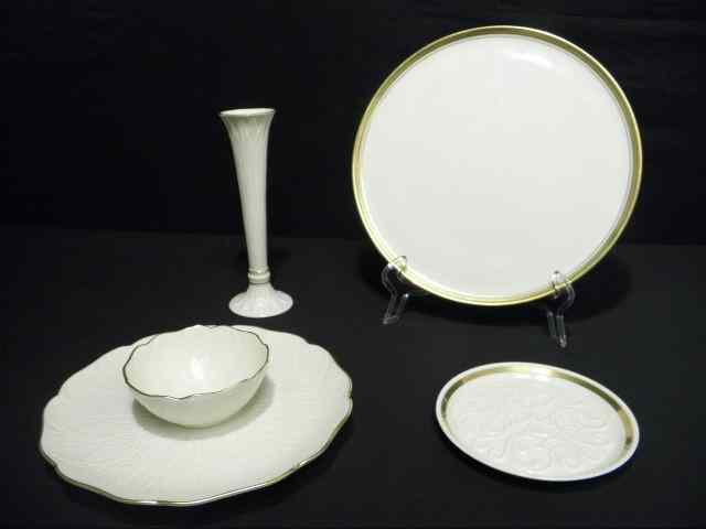 Appraisal: Four pieces of Lenox fine china Includes cake plate measuring