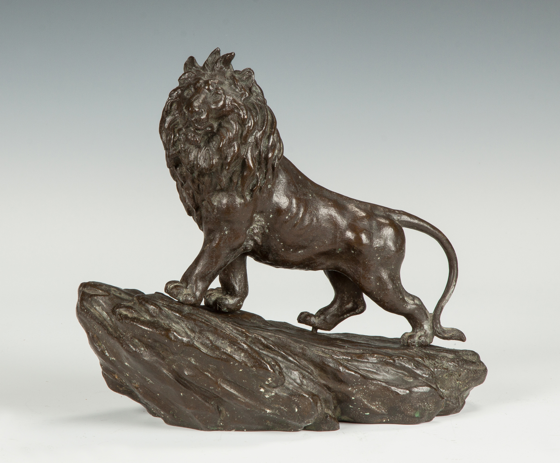 Appraisal: Bronze Sculpture of a Lion on a Mountain C Unsigned