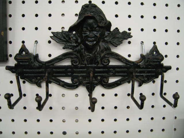 Appraisal: Black Americana Figural Coat Rack cast iron figure of black