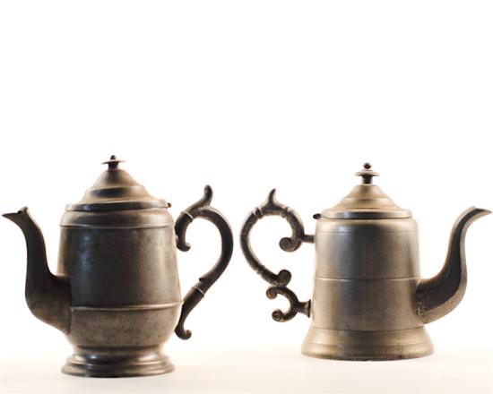 Appraisal: Two Early Pewter Teapots one unmarked high the other with