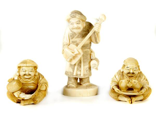 Appraisal: A group of three Japanese ivory figures including two of