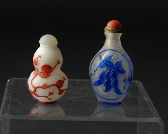 Appraisal: Two Cameo Carved Snuff Bottles a double gourd with red