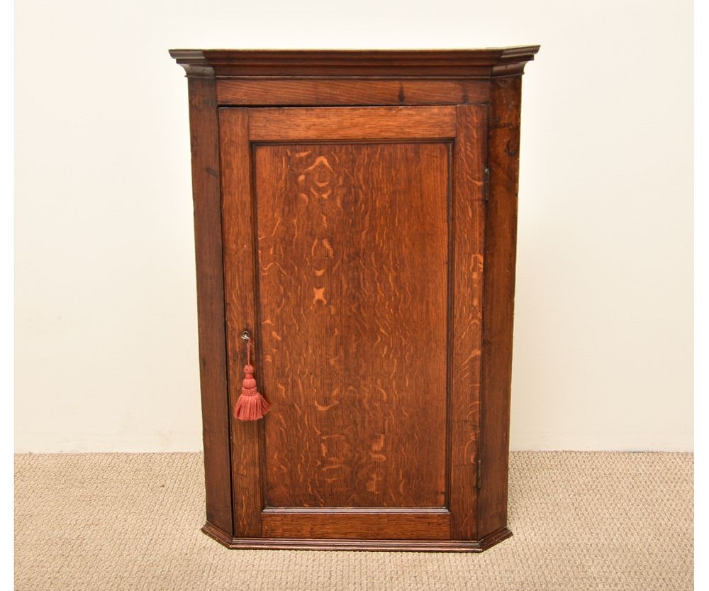 Appraisal: English Oak Corner Cupboard English oak corner cupboard th c