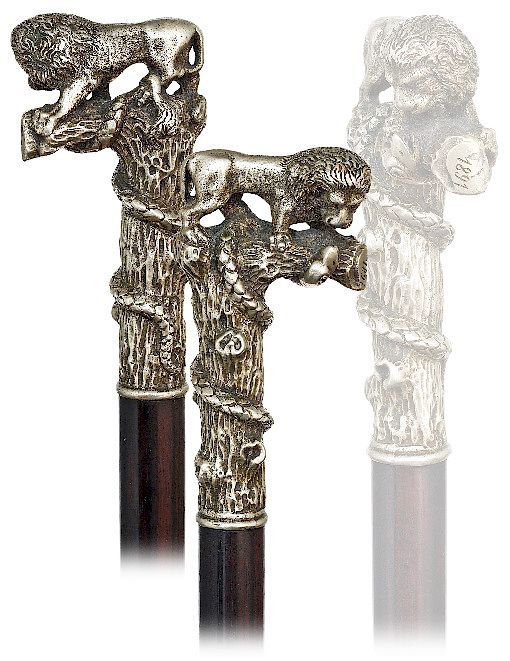 Appraisal: Knobkerrie Lion and Snake Cane -Dated -L-shaped white metal handle