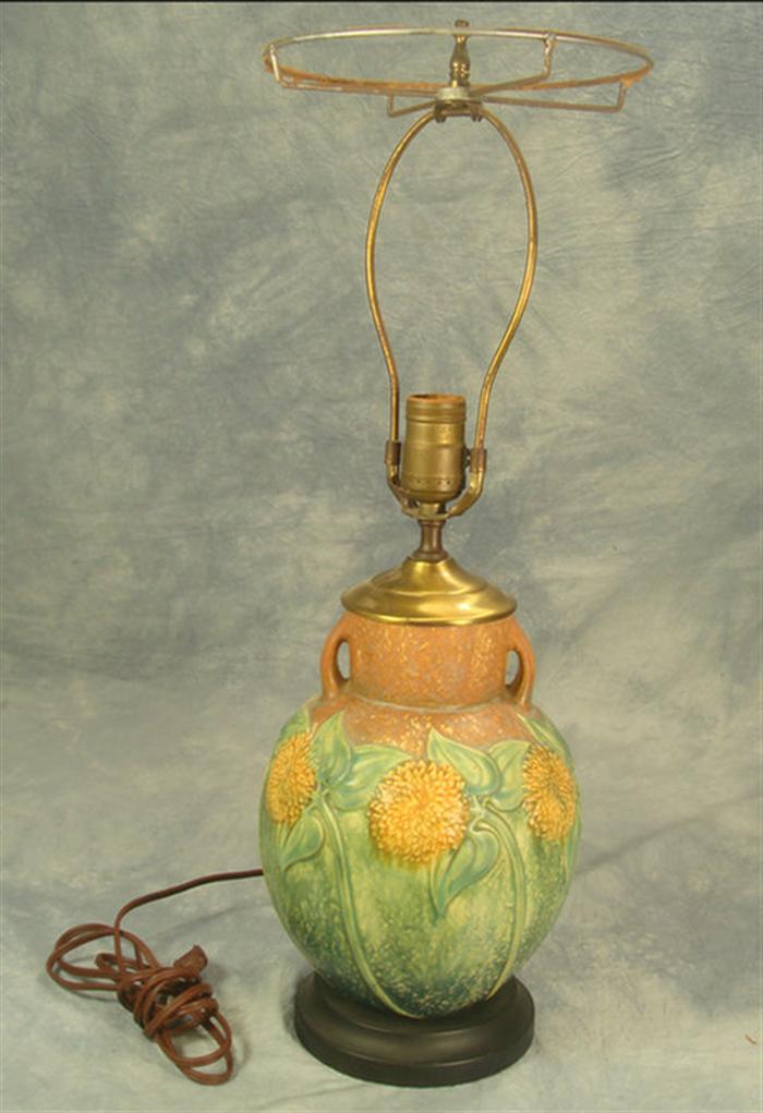 Appraisal: Roseville Sunflower double handled lamp shallow x chip on top