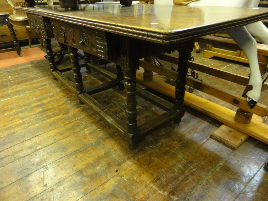 Appraisal: An antique oak serving table the associated overhanging rectangular walnut