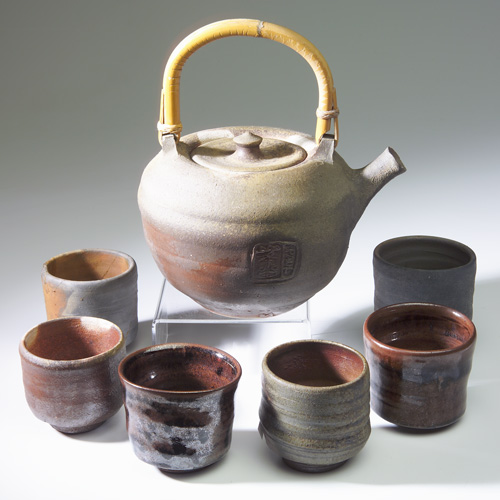 Appraisal: PAUL CHALEFF Stoneware tea set with a spherical teapot with