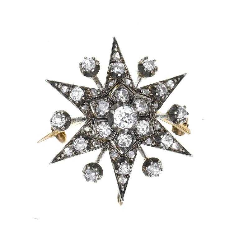 Appraisal: A VICTORIAN DIAMOND STAR BROOCH-PENDANT with old cut and rose