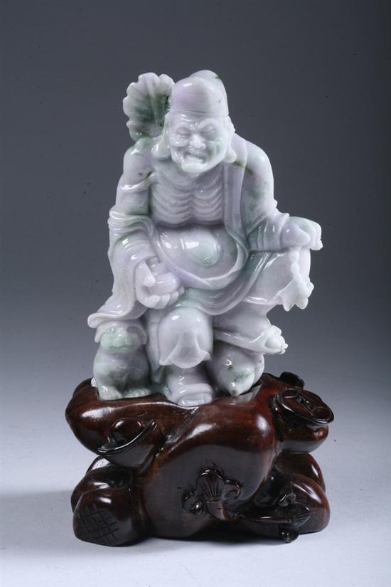 Appraisal: CHINESE LAVENDER AND APPLE GREEN JADEITE FIGURE OF IMMORTAL -