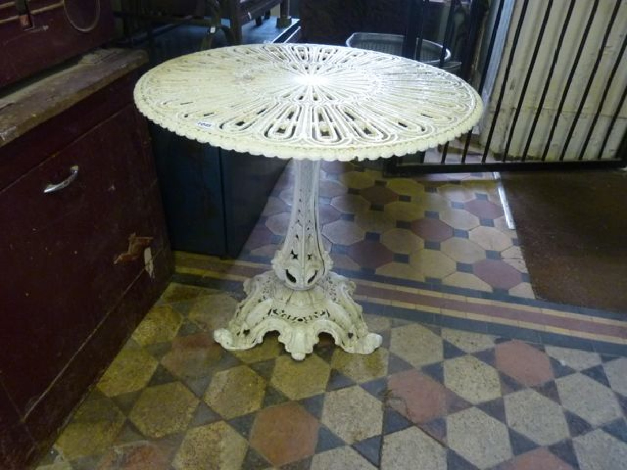 Appraisal: A Victorian cast iron occasional table the circular top with