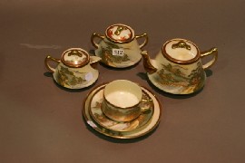 Appraisal: A Satsuma tea set depicting village scenes