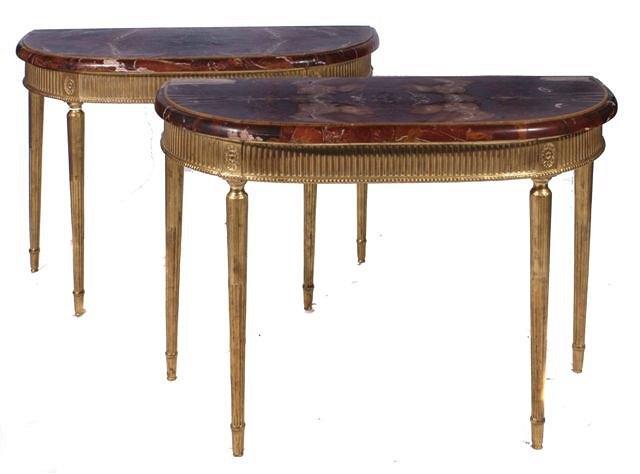 Appraisal: A PAIR OF GEORGE III STYLE GILTWOOD CONSOLE TABLES the