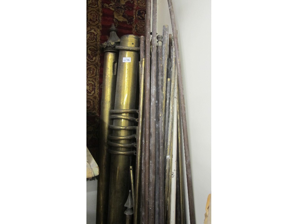 Appraisal: Lot of curtain poles and assorted brass and copper poles