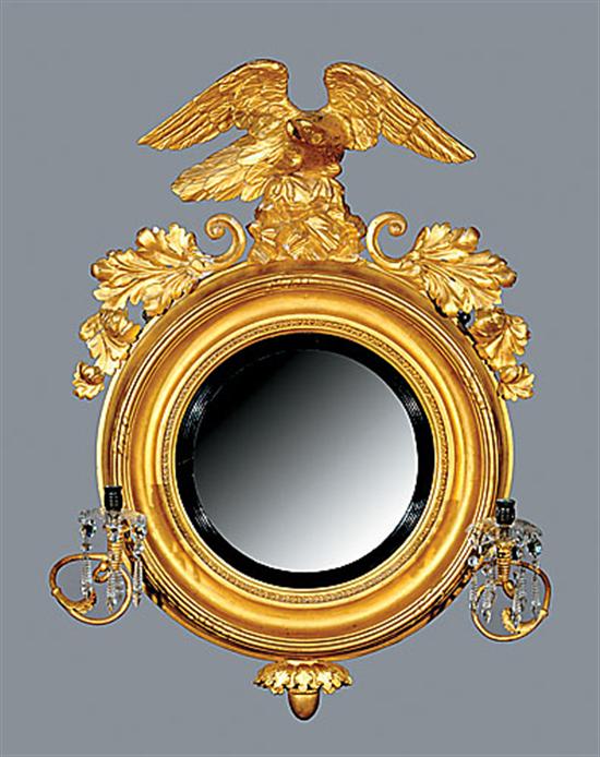 Appraisal: Regency bull's-eye looking glass first quarter th centuryeagle-and-leaf carved pediment