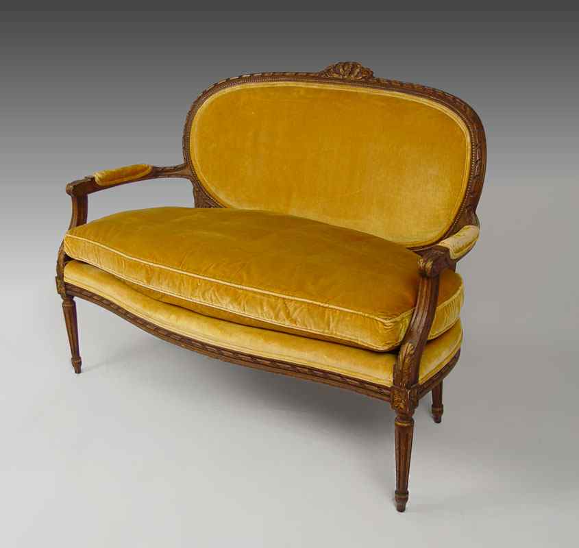 Appraisal: LOUIS XVI STYLE FRENCH SETTEE Carved wood with subtle gilt