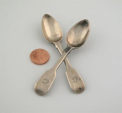 Appraisal: A pair of Victorian miniature or journeyman's spoons initialled 'C'