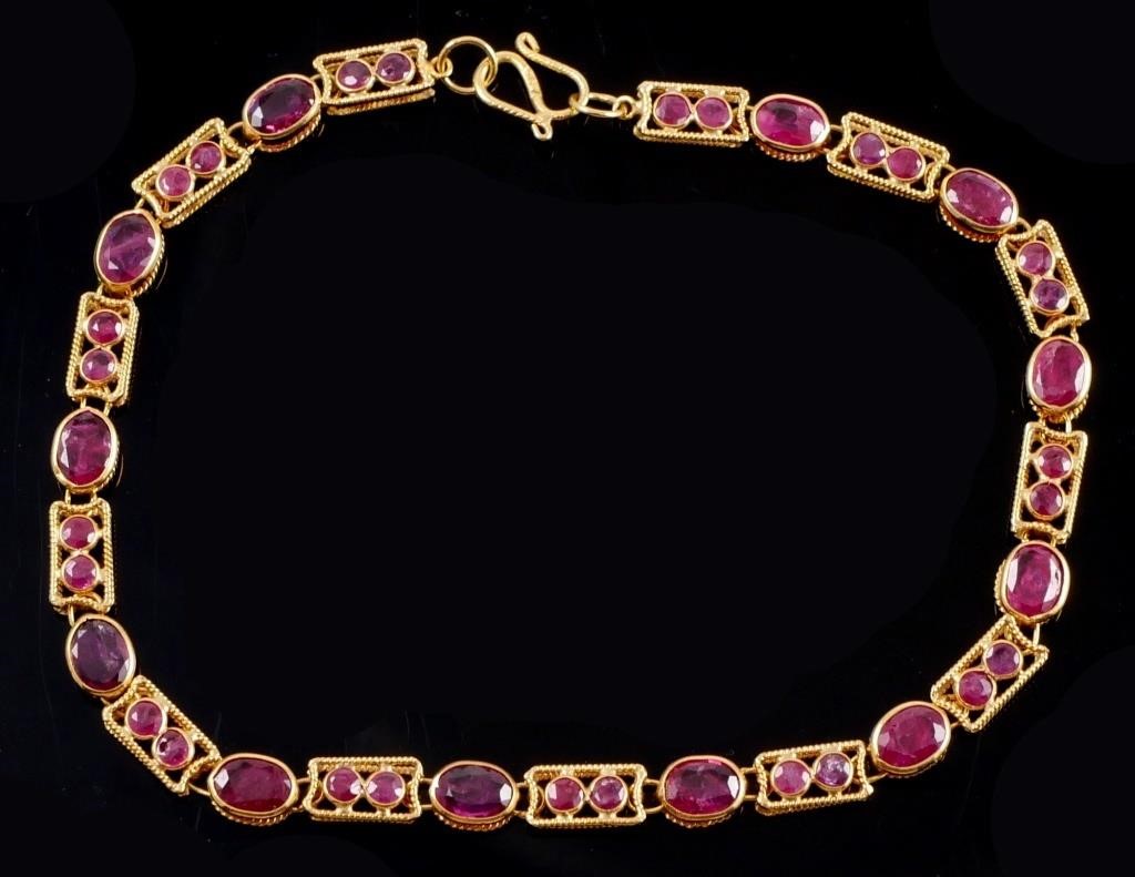 Appraisal: k yellow gold bracelet contains oval and round faceted pink