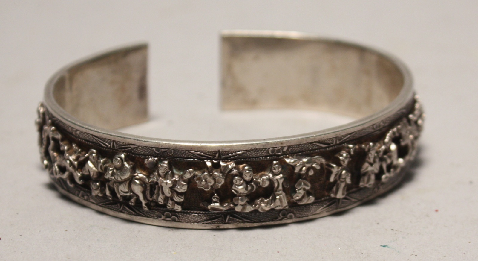 Appraisal: CHINESE EXPORT SILVER CUFF BRACELET With chased figural and floral