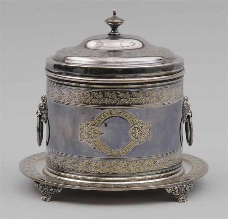 Appraisal: MAPPIN WEBB SILVER-PLATED OVAL BISCUIT BOX AND ATTACHED STAND Marked