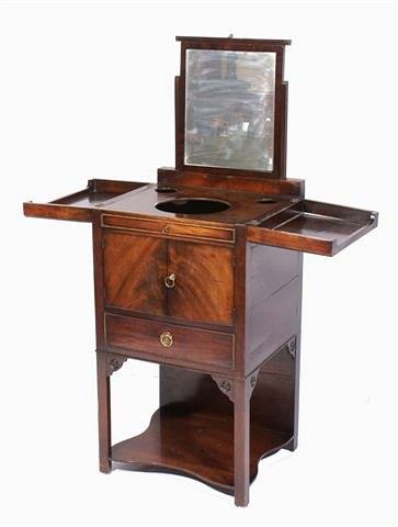 Appraisal: A George III enclosed wash stand with lifting mirror back