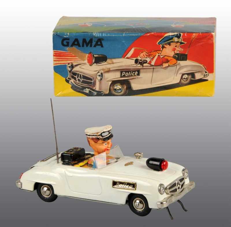 Appraisal: Tin Police Car Battery-Operated Toy Description German Working Marked Gama