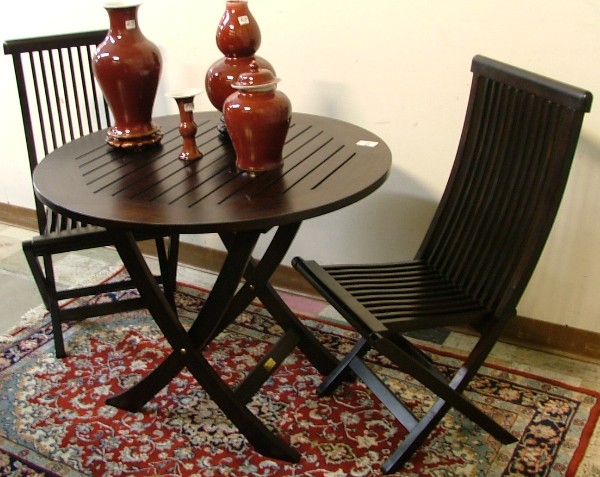 Appraisal: THREE-PIECE MAHOGANY CAFE TABLE AND CHAIR SET Smith Hawken recent