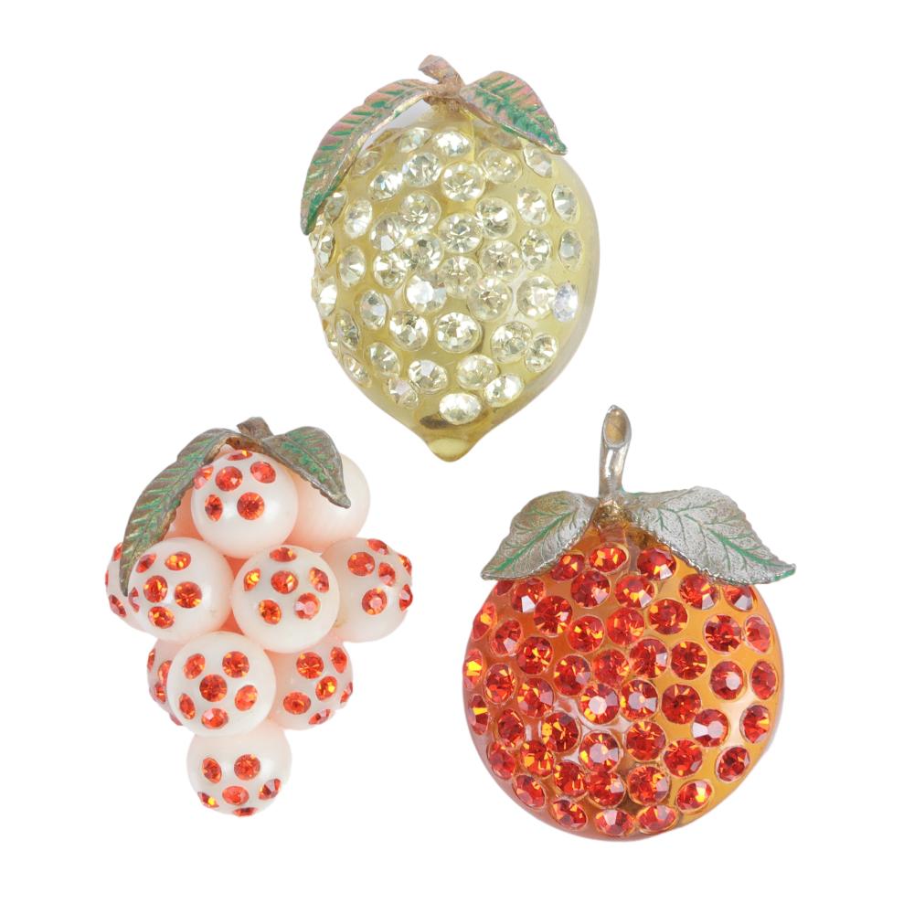 Appraisal: THREE AUSTRIAN CRYSTAL FRUIT PINS STUDDED WITH RHINESTONES AND ENAMEL