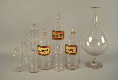 Appraisal: Eight continental clear glass drug jars with stoppers some with